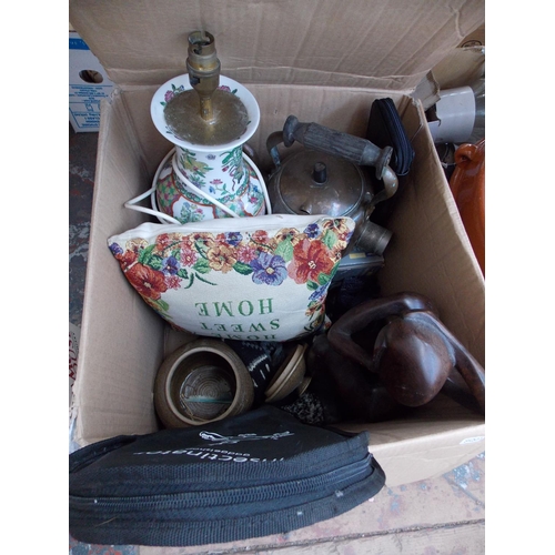 235 - TWO BOXES CONTAINING LAMPS, COPPER KETTLE, TENNIS RACKET, KITCHENALIA, CUSHION ETC