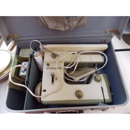 241 - A CASED BERNINA ELECTRIC SEWING MACHINE W/O