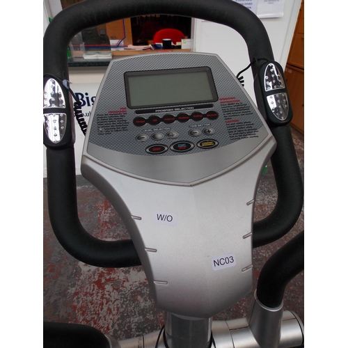 27 - A GREY STAFFS FITNESS CROSS TRAINING MACHINE WITH DIGITAL READOUT (W/O)