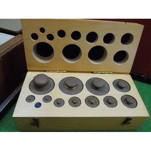 363 - A CASED SET OF WEIGHTS