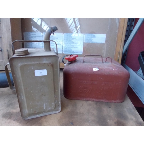 38 - TWO VINTAGE CANS TO INCLUDE A GREEN ESSO PARAFFIN CAN WITH SPOUT AND A RED BELL PETROL CAN