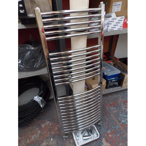 60 - A CHROME TOWEL RAIL MEASURING APPROX 118 X 50 CM WITH BRACKETS