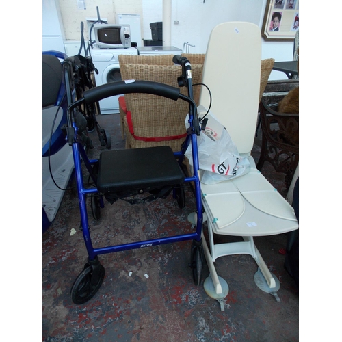 11 - TWO ITEMS OF MOBILITY EQUIPMENT TO INCLUDE A BLUE DRIVE FOUR WHEELED WALKING AID WITH BRAKES AND A W... 