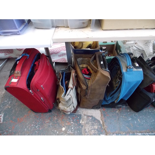 125 - A LARGE SELECTION OF BAGS AND SUITCASES TO INCLUDE CARLTON, JANSPORT, DERIMA ETC