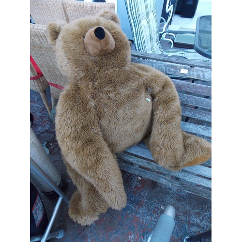 14 - A LARGE BROWN TEDDY BEAR