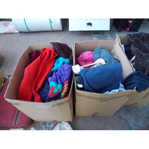 163 - FIVE BOXES AND A SUITCASE OF VINTAGE CLOTHING TO INCLUDE DRESSES, PARKA COAT, JUMPERS, CARDIGANS ETC