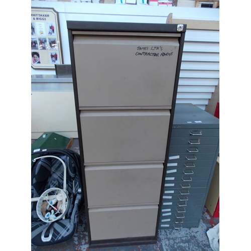 21 - A BROWN AND BEIGE TRIUMPH FOUR DRAWER OFFICE METAL FILING CABINET