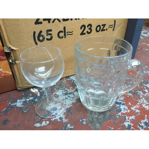 277 - TWO BOXES OF VARIOUS DRINKING GLASSES