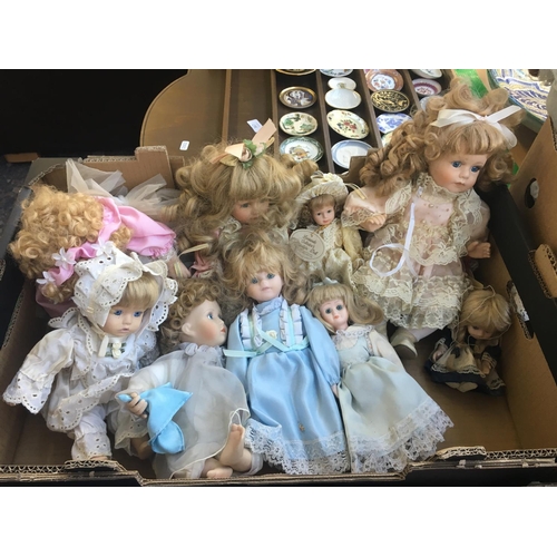 365 - THREE BOXES CONTAINING PORCELAIN COLLECTORS DOLLS AND BOOKS