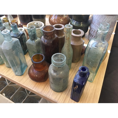 379 - THIRTY NINE VINTAGE GLASS BOTTLES