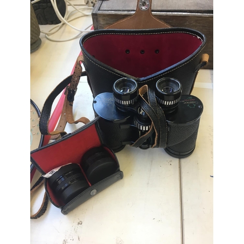 405 - A CASED SET OF 8 X 40 BINOCULARS AND TWO SPARE LENSES