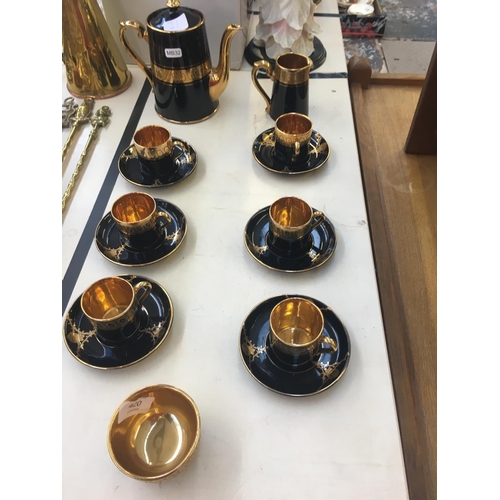 420 - A BLACK AND GOLD FOURTEEN PIECE GIBSON & SONS DAVENPORT COFFEE SET (9CT GOLD LEAF)