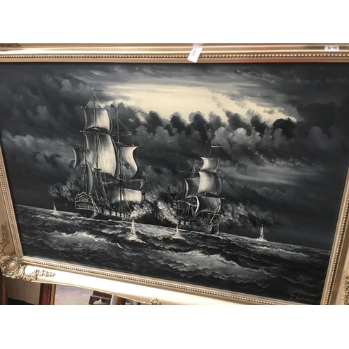 500 - A SILVER FRAMED OIL ON CANVAS OF A SHIP AT SAIL