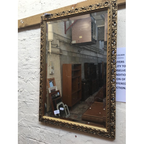 505 - A GILDED FRAMED BEVEL EDGED MIRROR