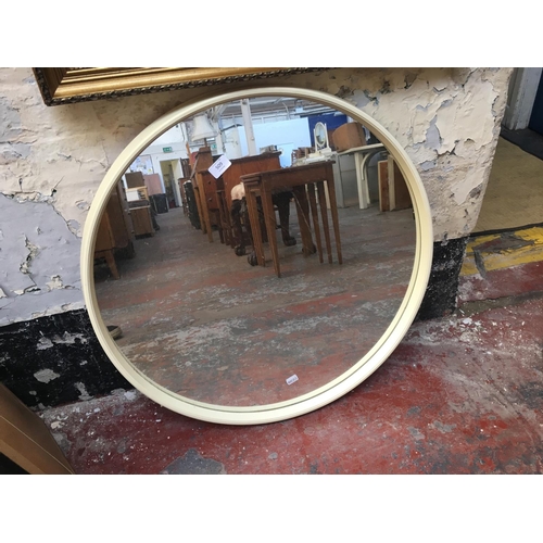 509 - A RETRO 1970'S ROUND WALL MIRROR