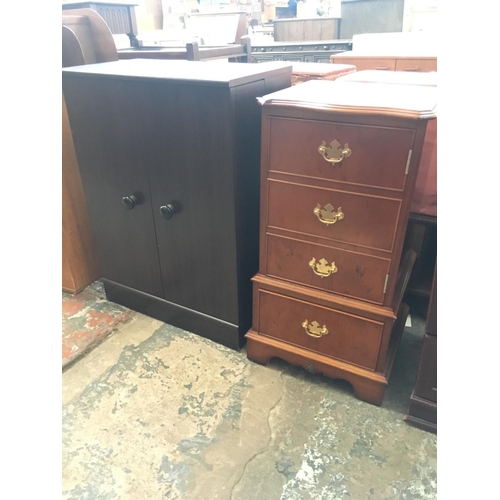 532 - TWO ITEMS TO INCLUDE A BURR WALNUT CUPBOARD AND A BLACK ASH CD CABINET