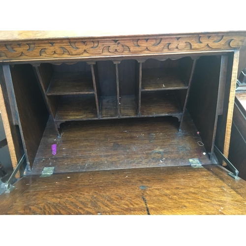 540 - AN OAK LADIES BUREAU WITH ONE DRAWER, TWO SHELVES AND A FALL FRONT