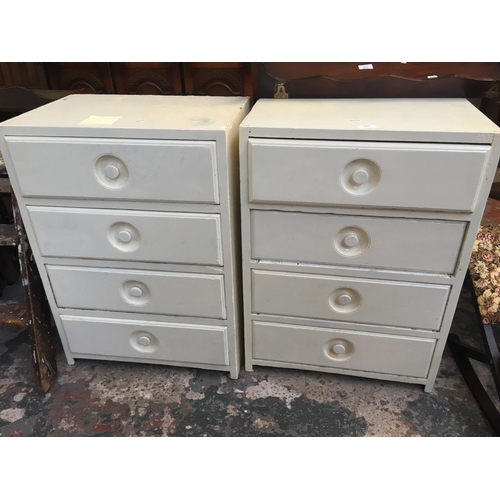 543 - TWO WHITE PAINTED CHESTS OF FOUR DRAWERS