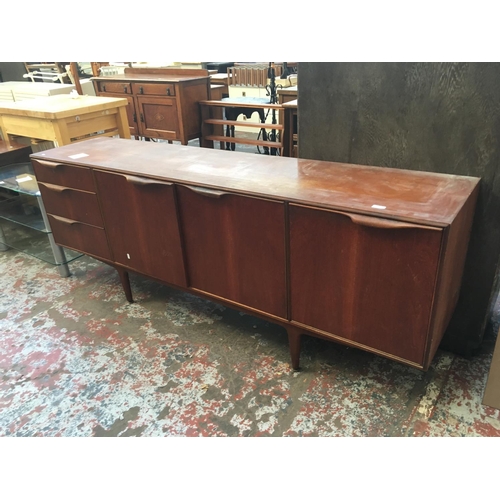 567 - A RETRO McINTOSH TEAK SIDEBOARD WITH THREE DRAWERS AND THREE DOORS