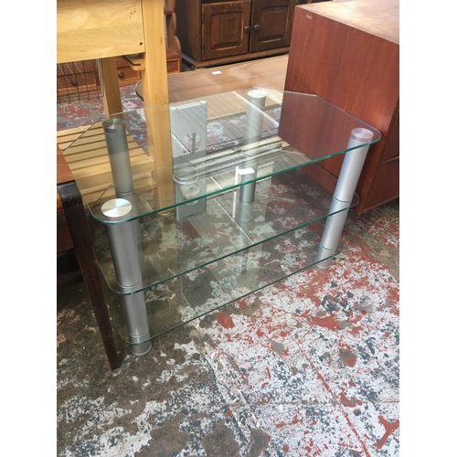 568 - A GLASS TV STAND