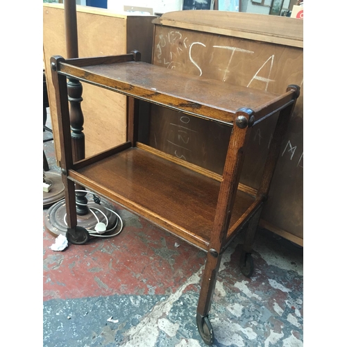 576 - A VINTAGE OAK TEA TROLLEY