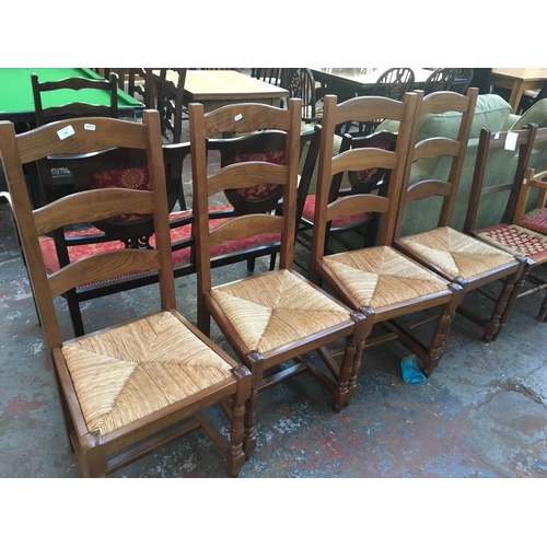 650 - FOUR MATCHING MAHOGANY DINING CHAIRS