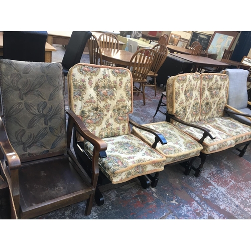 652 - A TWO PIECE TAPESTRY LOUNGE SUITE COMPRISING OF A TWO SEATER SOFA, ROCKING CHAIR AND A FOOT STOOL TO... 