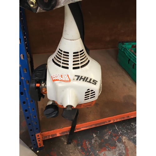 51 - ORANGE AND WHITE STIHL PETROL STRIMMER (Model FS55)  (W/O)