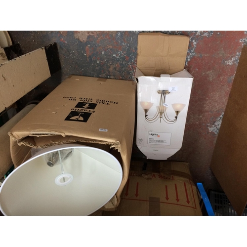 333 - TWO BOXES CONTAINING A TABLE LAMP AND A CEILING LIGHT