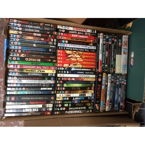 335 - THREE BOXES CONTAINING MIXED DVD'S AND CD'S TO INCLUDE RAMBO, JURASSIC WORLD, WAR OF THE WORLDS, TAK... 