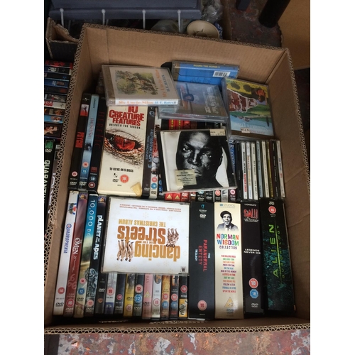 335 - THREE BOXES CONTAINING MIXED DVD'S AND CD'S TO INCLUDE RAMBO, JURASSIC WORLD, WAR OF THE WORLDS, TAK... 