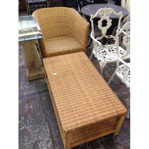 35 - TWO ITEMS TO INCLUDE A WICKER PATIO CHAIR WITH MATCHING RECTANGULAR COFFEE TABLE