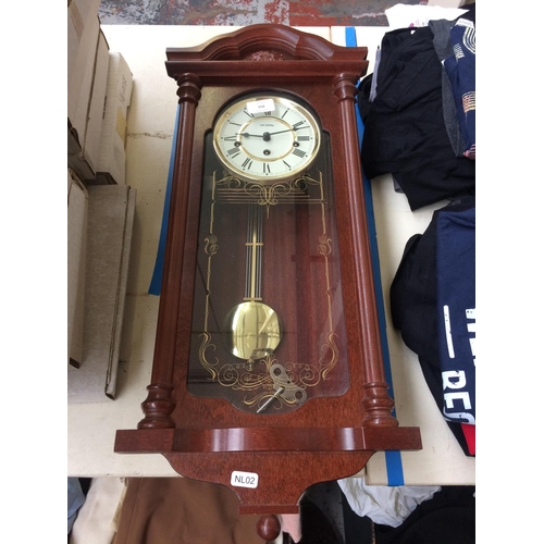 355 - A MODERN MAHOGANY WESTMINSTER CHIME WALL CLOCK WITH PENDULUM AND KEY