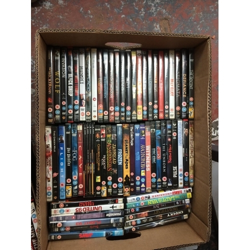 335 - THREE BOXES CONTAINING MIXED DVD'S AND CD'S TO INCLUDE RAMBO, JURASSIC WORLD, WAR OF THE WORLDS, TAK... 