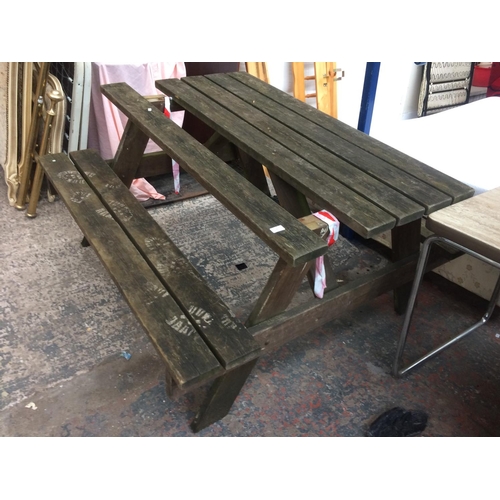 25 - A WOODEN PUB STYLE GARDEN TABLE AND BENCH