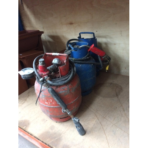 49 - THREE ITEMS TO INCLUDE PROPANE AND CALOR GAS BOTTLES WITH REGULATORS AND BLOW TORCHES PLUS SPARE CAL... 