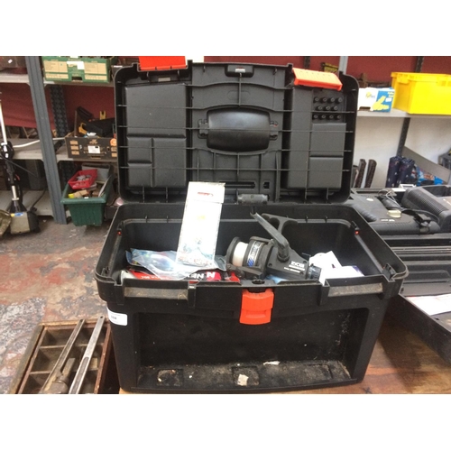 104 - A BLACK PLASTIC TOOLBOX CONTAINING FISHING EQUIPMENT TO INCLUDE RYOBI REEL, HOOKS, LINE ETC