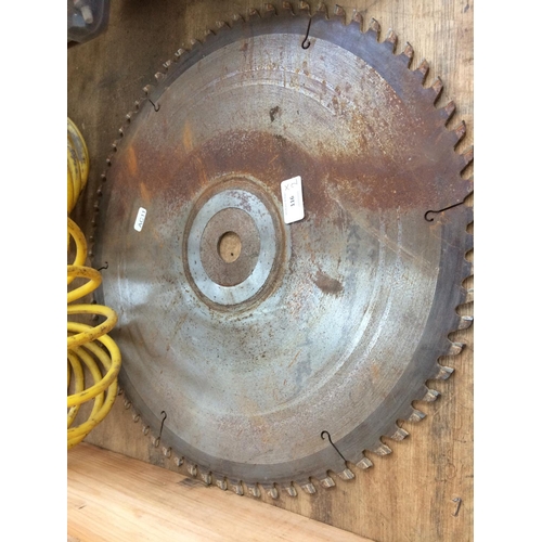 116 - TWO ITEMS TO INCLUDE A 17 INCH CIRCULAR SAW BLADE AND A YELLOW AIRLINE PIPE WITH ATTACHMENT