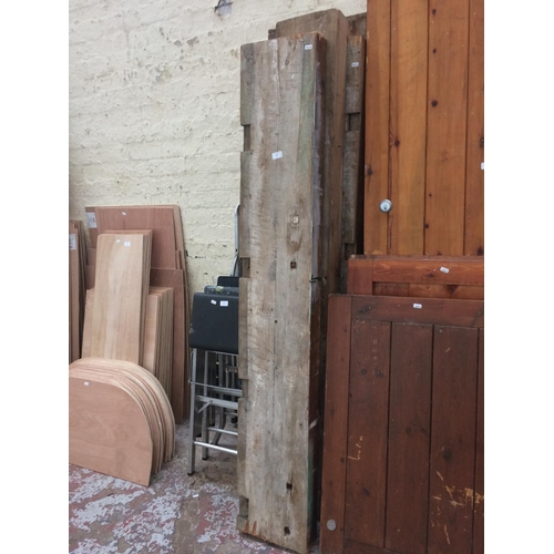 92 - FOUR VARIOUS LENGTHS OF TIMBER MEASURING APPROX 11