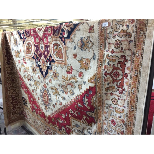 722 - A BEIGE GROUND HERIZ CARPET MEASURING 2.8m x 2.0m