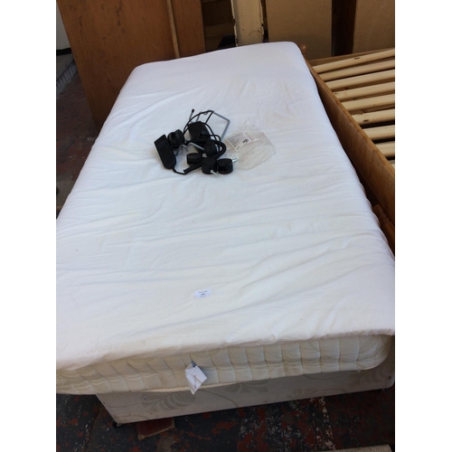 717 - A SINGLE DIVAN BED AND MATTRESS