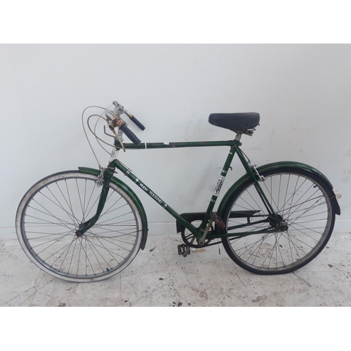 10 - A VINTAGE GREEN PUCH GENTS TOURING BIKE WITH FRONT SADDLE AND 3 SPEED GEAR SYSTEM