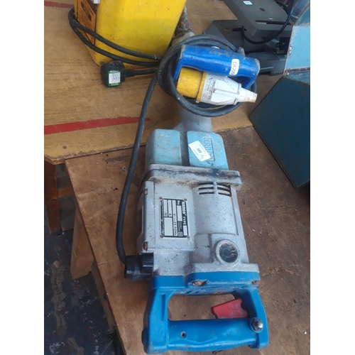 102 - TWO ITEMS TO INCLUDE A 3.3 KVA TWIN SOCKET 110 VOLT TRANSFORMER AND A KANGO TYPE 990 110 VOLT ROCK B... 