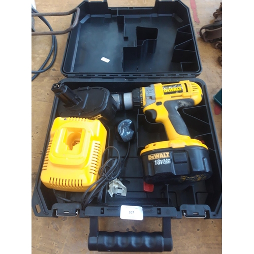 107 - A CASED DEWALT 18 VOLT CORDLESS DRILL WITH TWO BATTERIES AND CHARGER (Model DC988) (W/O)