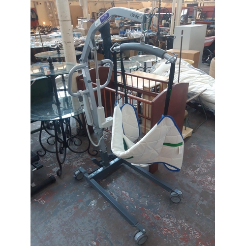 32 - A GREY BEAULIFT MINI 150 DISABLED SWL 150KG LIFTING HOIST (W/O)