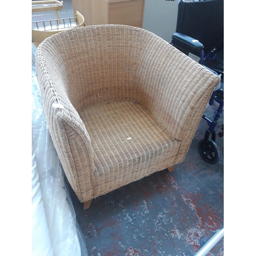 37 - A WICKER CONSERVATORY ARMCHAIR WITH CHECKED CUSHION