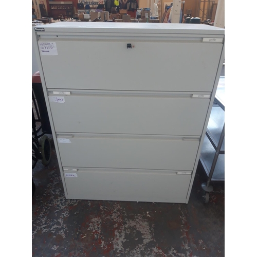 42 - A TRIUMPH GREY METAL FOUR DRAWER OFFICE FILING CABINET