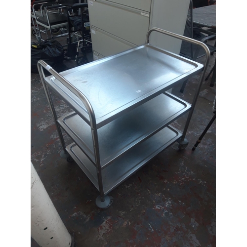 43 - A GOOD QUALITY STAINLESS STEEL THREE SHELF SERVING TROLLEY