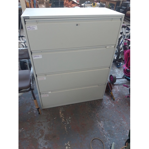 45 - A TRIUMPH GREY METAL FOUR DRAWER OFFICE FILING CABINET