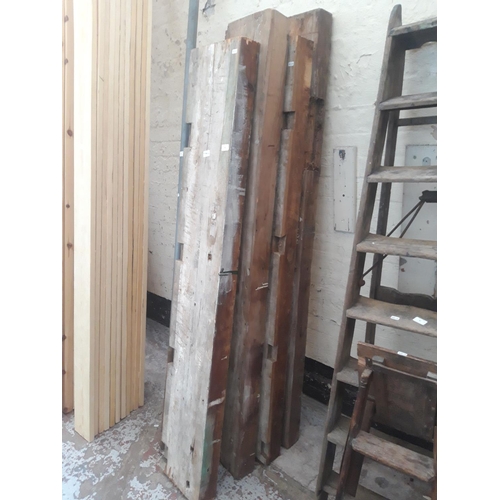 82 - FOUR VARIOUS LENGTHS OF TIMBER MEASURING APPROX 11